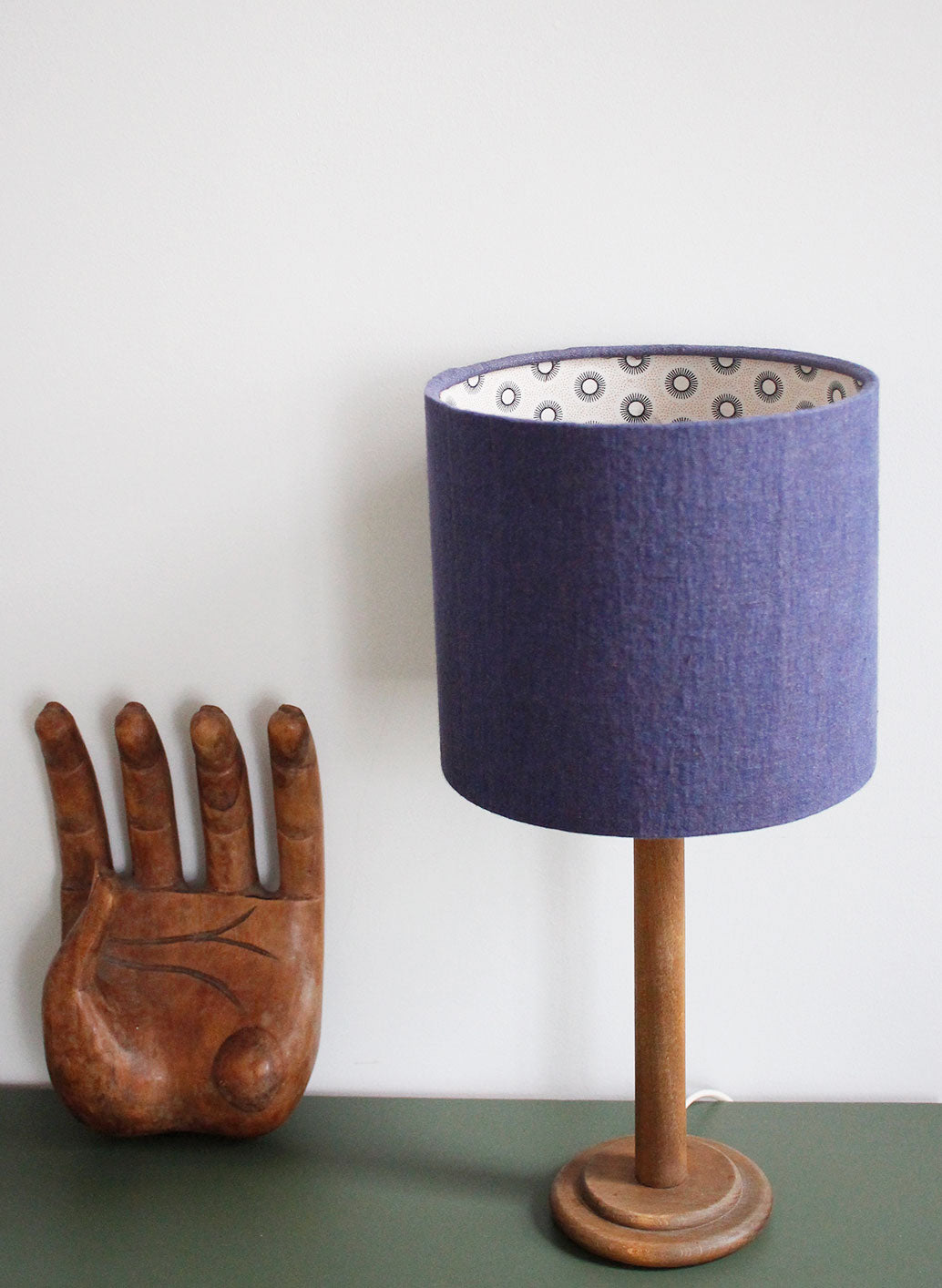 Modern eclectic bedside lamp. Blue linen lampshade with South African printed lining